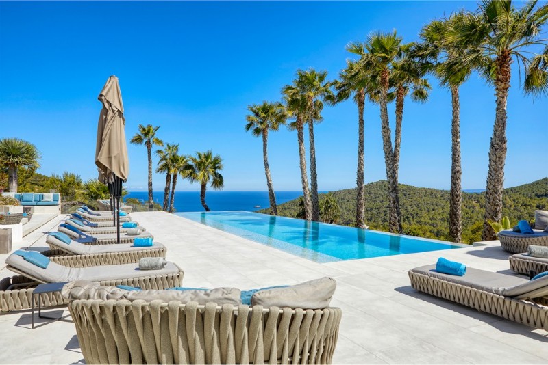 pool with sea in the background