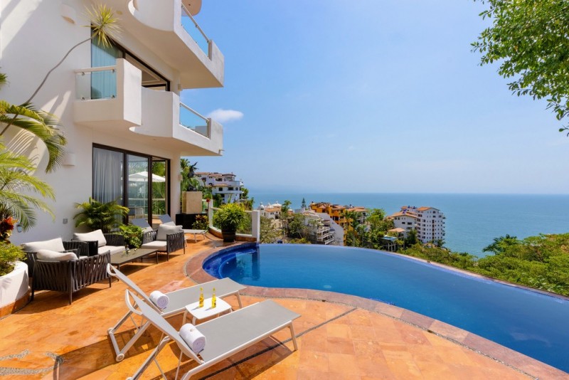 pool with sea in the background