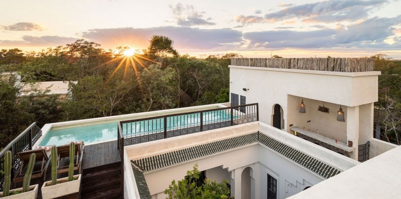 view of villa and pool