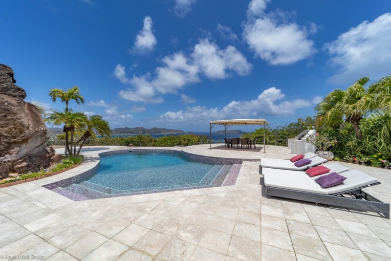 pool with sea in the background