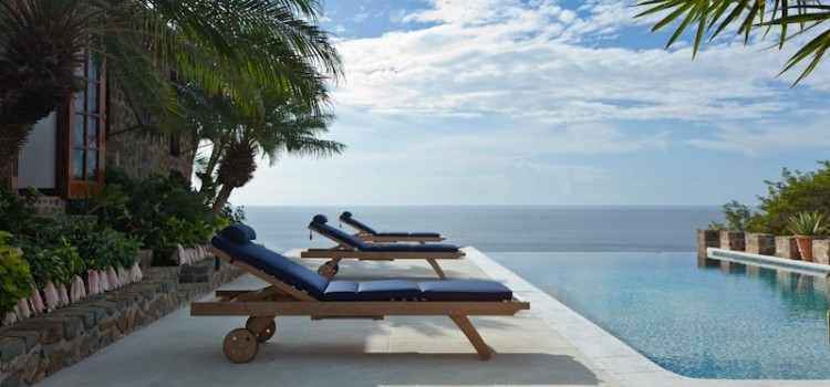 Sunloungers and pool at Hummingbird Villa in Mustique