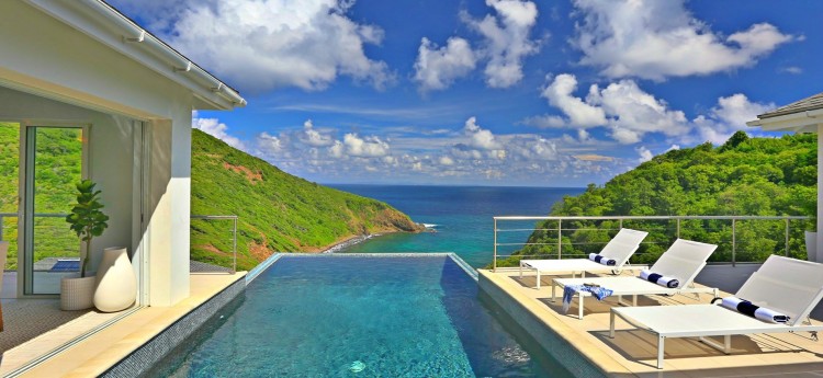 Welcome to Xhale, a luxurious 4-bedroom villa located in St. Lucia’s pristine Cap Estate.